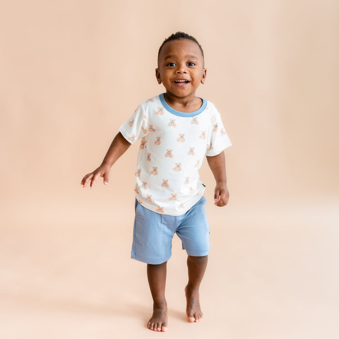 toddler boy modeling Toddler Basic Tee in Teddy Bear