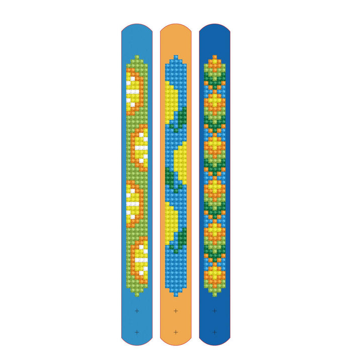 Set of three vertical slap bracelets by Diamond Dotz—Gone Troppo Bracelets—with pixel art pumpkins, wavy green and yellow shapes, and yellow-orange flowers. Great for kids' crafts or as a Diamond Dotz kit accessory.
