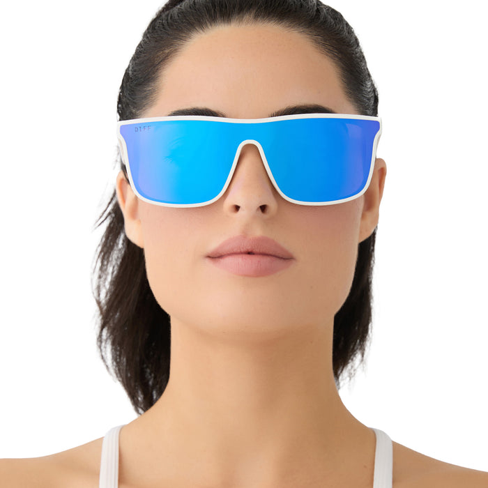 on model - female wearing diff sport featuring the flash square sunglasses with a matte white frame and purple mirror polarized lenses front view