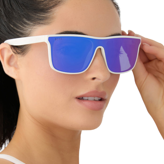 on model - female wearing diff sport featuring the flash square sunglasses with a matte white frame and purple mirror polarized lenses side view