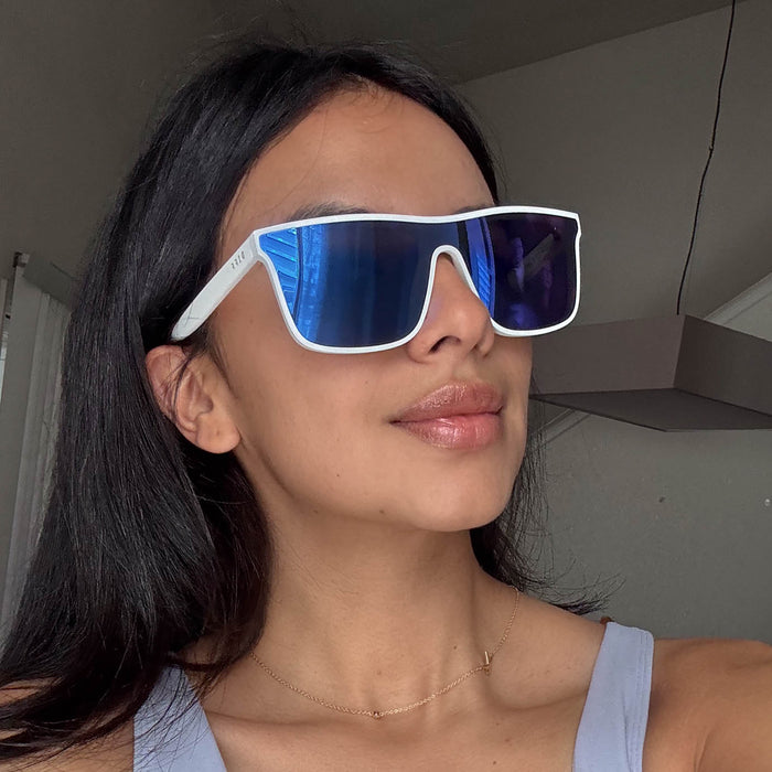 customer content - k.modemood wearing diff sport featuring the flash square sunglasses with a matte white frame and purple mirror polarized lenses