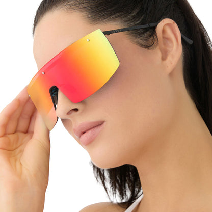 on model - female wearing diff sport featuring the grandslam shield sunglasses with a black frame and rainbow mirror polarized lenses angled view