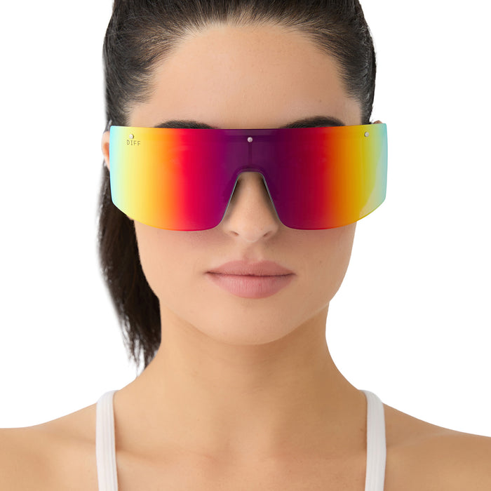 on model - female wearing diff sport featuring the grandslam shield sunglasses with a black frame and rainbow mirror polarized lenses front view