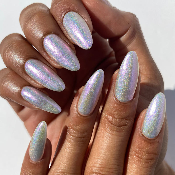 Nails painted with Boneyard Nail Lacquer on medium skin tone.