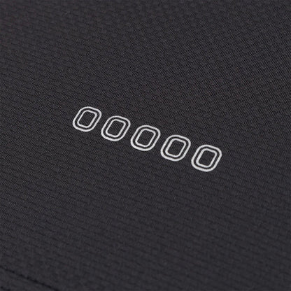 Up close view of emblem on the Overtime Kids' Tuff Performance Tee.