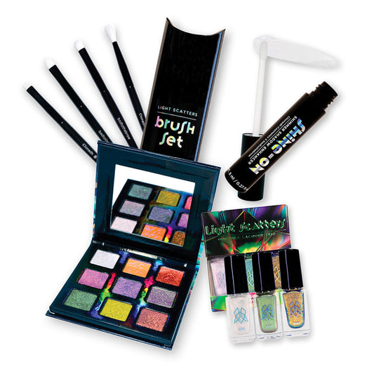 Light Scatters Palette, Brush Set, Mini Nail Trio and Shine-On Shimmer Shadow Enhancer layed out on a white background.