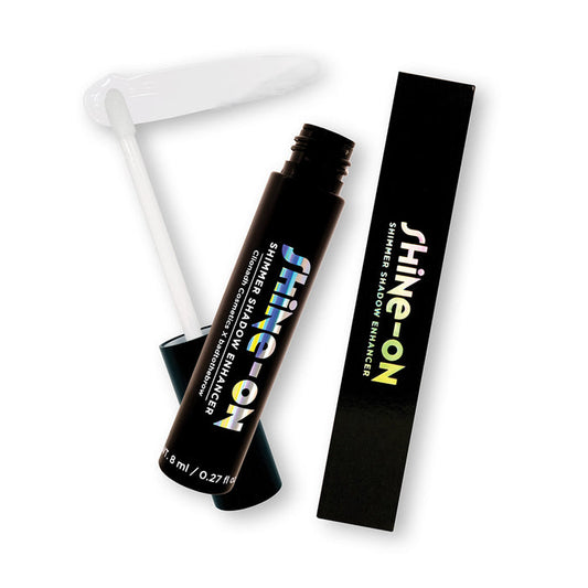 Light Scatters Shine-On Shimmer Shadow Enhancer tube and it's outer packaging on a white background.