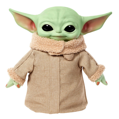 The Mattel Star Wars Grogu Squeeze & Blink plush features the big-eared character in a tan coat with fuzzy collar and cuffs. With expressive blinking eyes, it's a unique gift for any Star Wars fan.