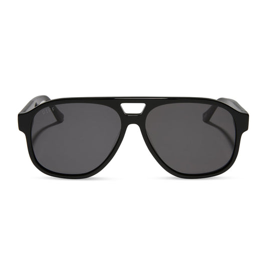 jessie james decker x diff eyewear featuring the nash navigator sunglasses with a black frame and grey lenses front view