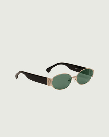 White Gold Pond::Moya Sunglasses oval Gold metal front diagonal