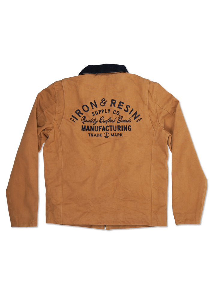 Brown jacket with "Iron & Resin Supply Co. Quality Crafted Goods Manufacturing" text on back. Black collar, long sleeves.