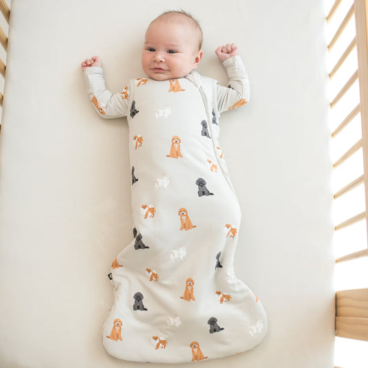Baby wearing Sleep Bag in Fluffy Dog 1.0 in crib