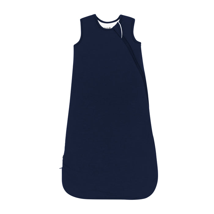 Flat lay of Kyte Baby Sleep Bag in Navy 2.5