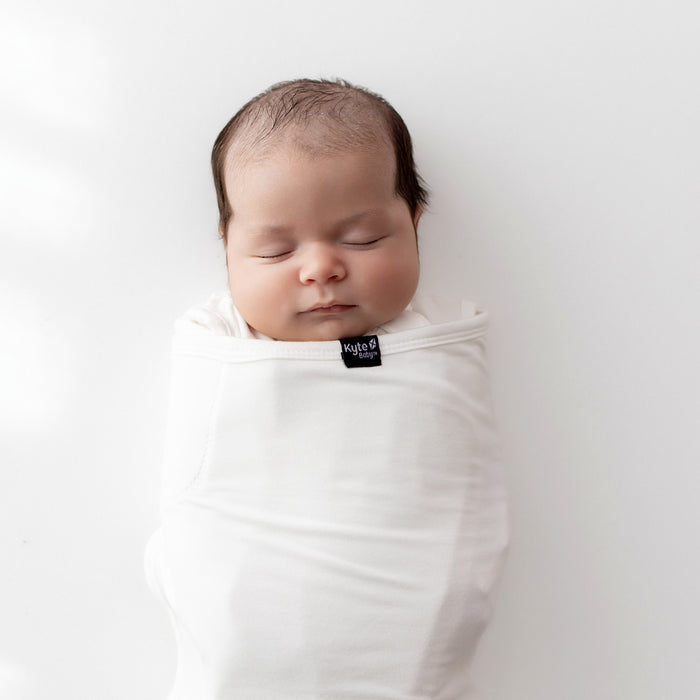 Close up of Baby swaddled sleeping in Sleep Bag Swaddler in Cloud 0.5