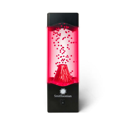 The Smithsonian Volcano Tank features a rectangular black design with clear front, red lighting, and red beads rising from a volcano base. The Smithsonian name and sunburst logo appear on the bottom front, ideal for geology or science displays.