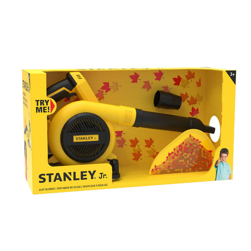 The Red Toolbox Stanley Jr. Power Blower is a yellow and black battery-operated outdoor toy for ages 3+, displayed in a box with autumn leaf graphics, a Try Me! label, and a smiling child on the packaging.