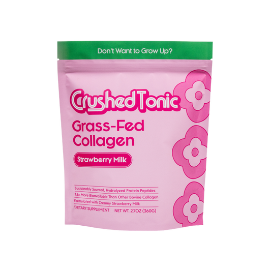 Pink package of Crushed Tonic Grass-Fed Collagen Strawberry Milk flavor on a white background