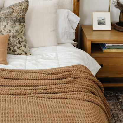 Elegant king waffle knit blanket featuring a classic, grid-like weave.